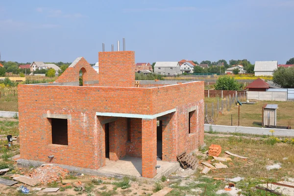 Brick building house construction with chimney
