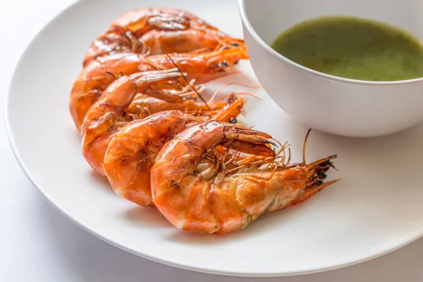 Colorful delicious grilled shrimp with spicy seafood sauce,  Clo