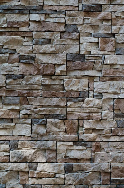 Cladding texture of a stone wall, background of natural stone materials