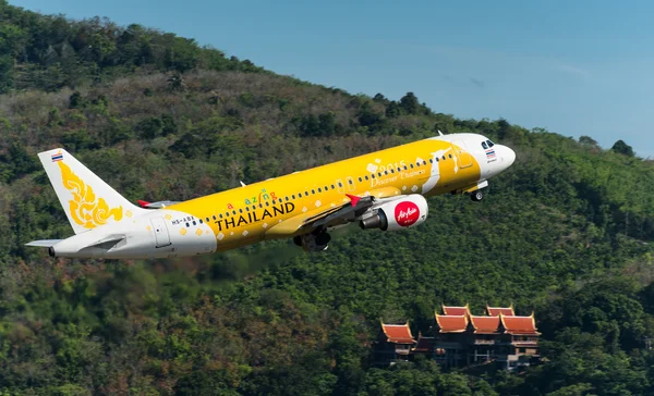 Airasia airways airplane take off  at phuket