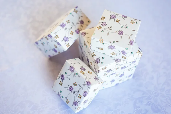 Floral pattern simple boxes for stuff and wedding decoration on a white simple background