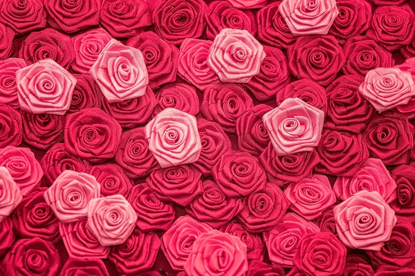 Satin atlas ribbon red and pink roses pattern background