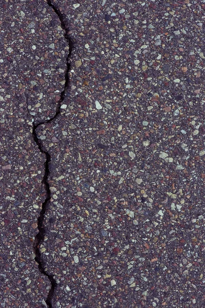 Close-Up texture of damaged asphalt road surface