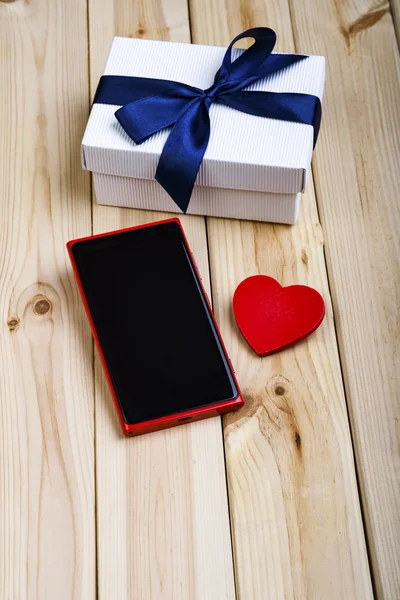 Smart Phone, Gift Box And Heart.