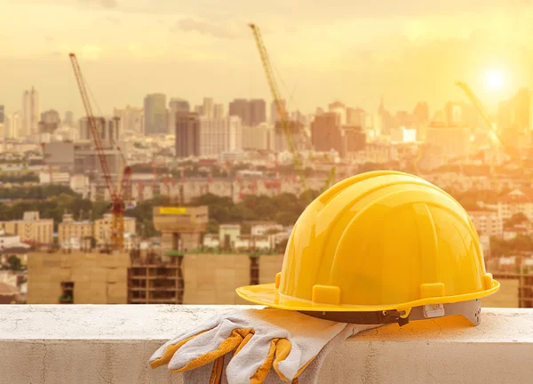 Yellow hard hat on construction site