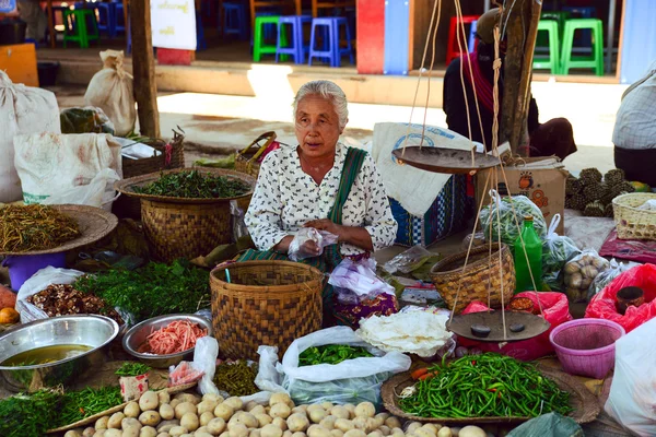 An ethnic minority woman sell vegetables