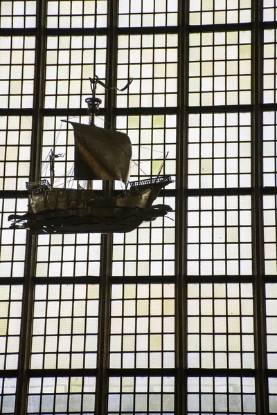 Stained-glass window with the silhouette of the boat