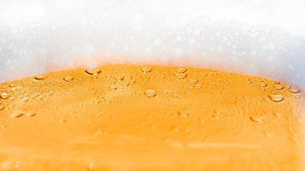 Background beer with foam and bubbles