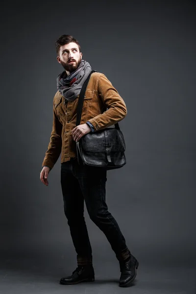Stylish man with black leather bag