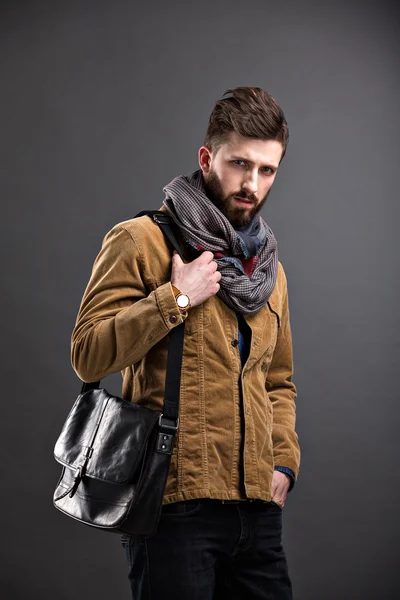 Stylish man with black leather bag