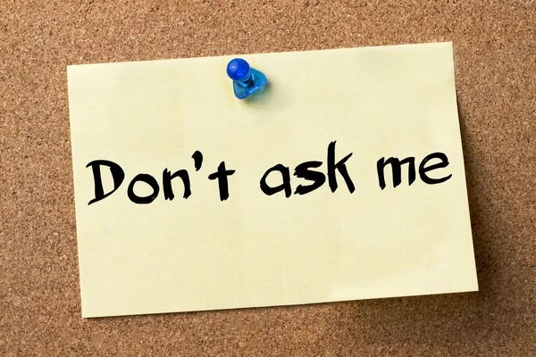 Don't ask me - adhesive label pinned on bulletin board