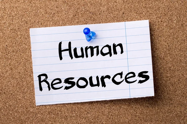 Human Resources - teared note paper pinned on bulletin board