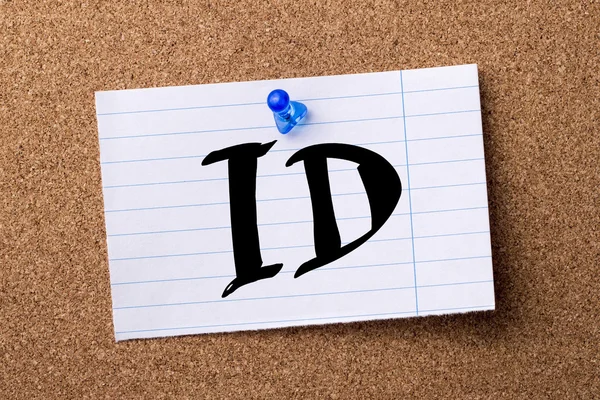 ID - teared note paper pinned on bulletin board