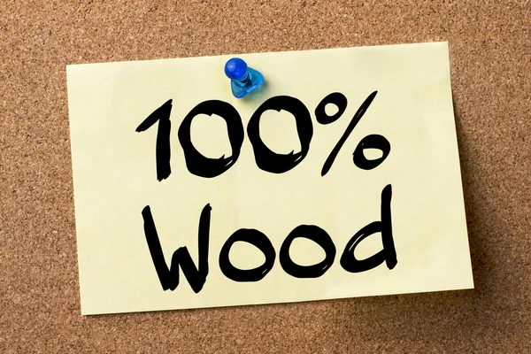 100% Wood - adhesive label pinned on bulletin board
