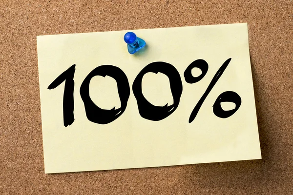 100% - adhesive label pinned on bulletin board