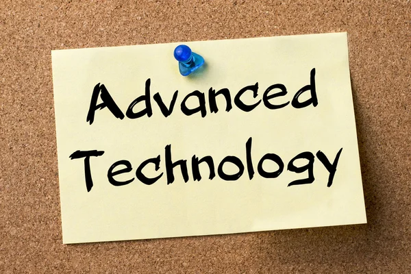 Advanced technology - adhesive label pinned on bulletin board
