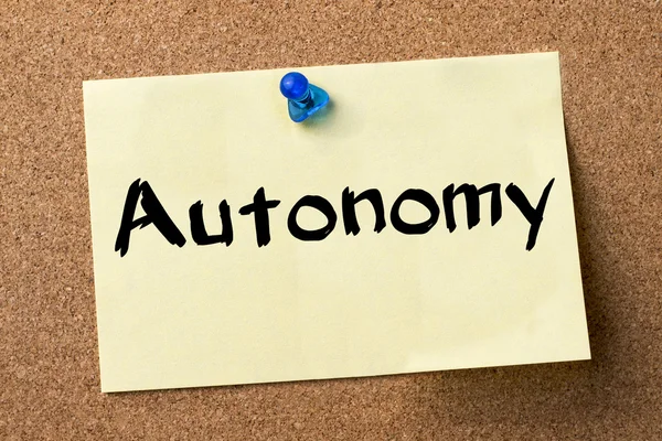 Autonomy - adhesive label pinned on bulletin board