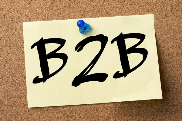 B2B - adhesive label pinned on bulletin board
