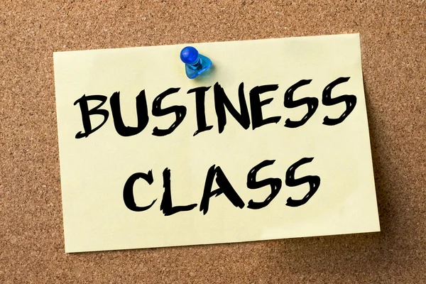 BUSINESS CLASS - adhesive label pinned on bulletin board