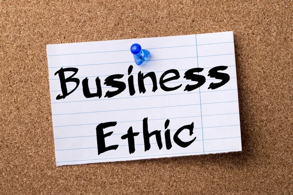 Business Ethic - teared note paper pinned on bulletin board