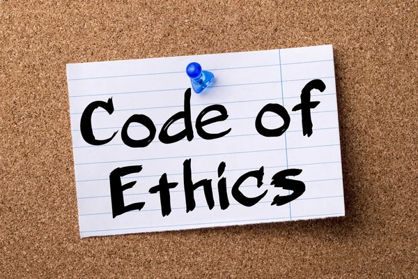 Code of Ethics - teared note paper pinned on bulletin board