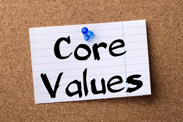 Core Values - teared note paper pinned on bulletin board