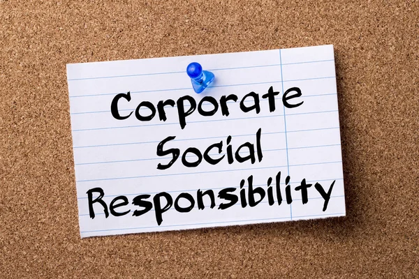 Corporate Social Responsibility CSR - teared note paper pinned o