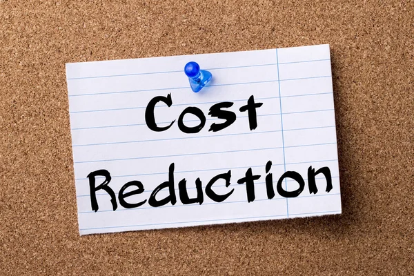 Cost Reduction - teared note paper pinned on bulletin board