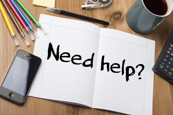 Need help? - Note Pad With Text On Wooden Table