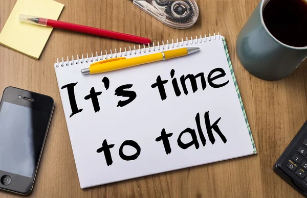 Time to talk - Note Pad With Text On Wooden Table