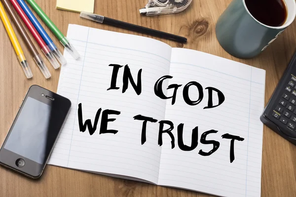 IN GOD WE TRUST - Note Pad With Text On Wooden Table
