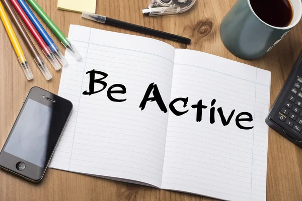 Be Active - Note Pad With Text On Wooden Table