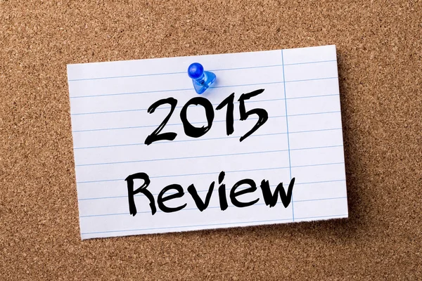 2015 Review - teared note paper  pinned on bulletin board