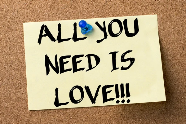 ALL YOU NEED IS LOVE!!! - adhesive label pinned on bulletin boar