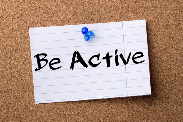 Be Active - teared note paper  pinned on bulletin board
