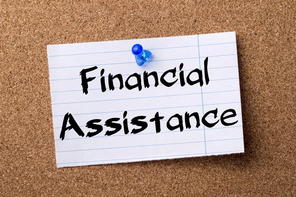 Financial Assistance - teared note paper  pinned on bulletin boa