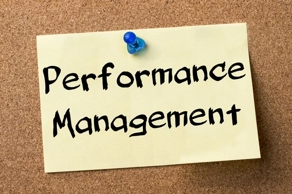 Performance Management - adhesive label pinned on bulletin board