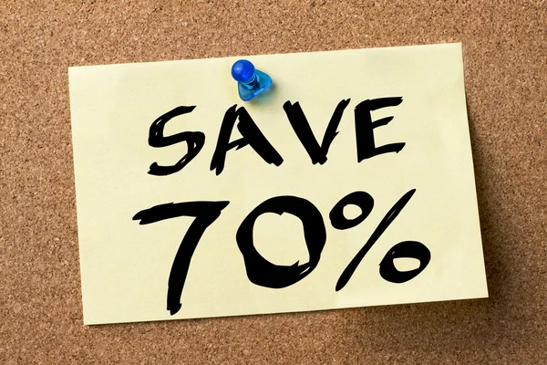 SAVE 70 percent - adhesive label pinned on bulletin board