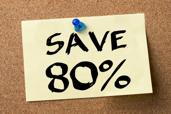 SAVE 80 percent - adhesive label pinned on bulletin board
