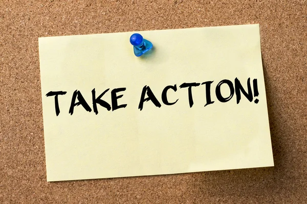 TAKE ACTION! - adhesive label pinned on bulletin board