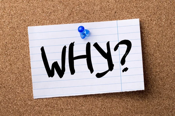 WHY? - teared note paper  pinned on bulletin board