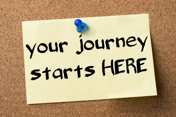 Your Journey starts HERE - adhesive label pinned on bulletin boa