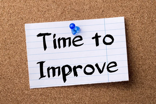 Time to Improve - teared note paper pinned on bulletin board