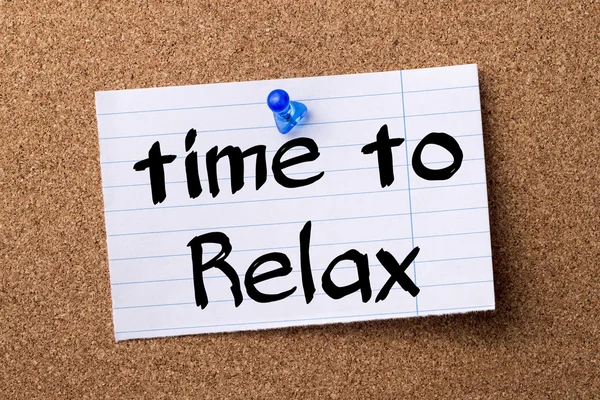 Time to Relax - teared note paper pinned on bulletin board