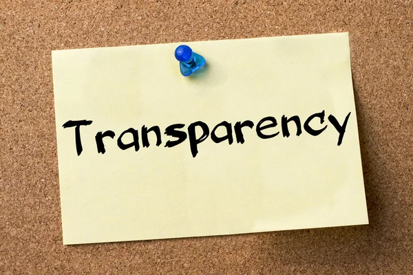 Transparency - adhesive label pinned on bulletin board