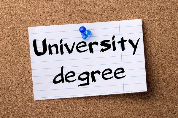 University degree - teared note paper pinned on bulletin board