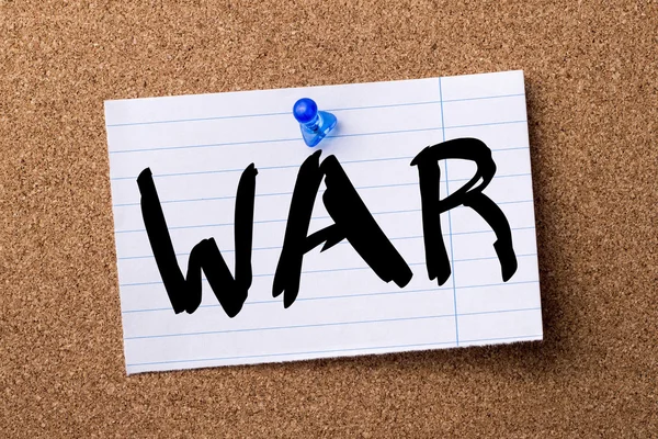 WAR - teared note paper pinned on bulletin board