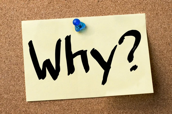 Why? - adhesive label pinned on bulletin board