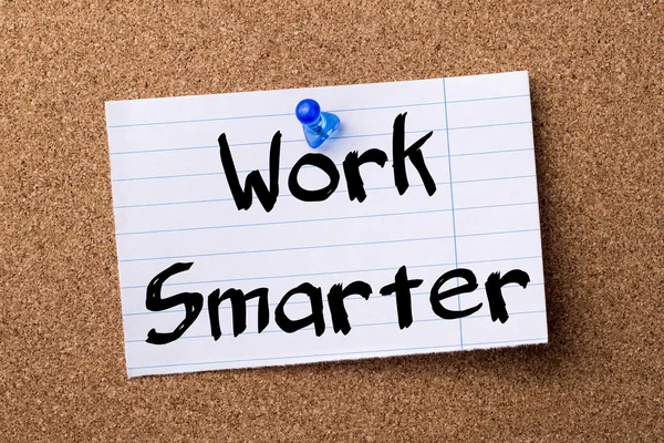 Work Smarter - teared note paper pinned on bulletin board