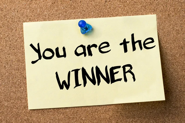 You are the WINNER - adhesive label pinned on bulletin board